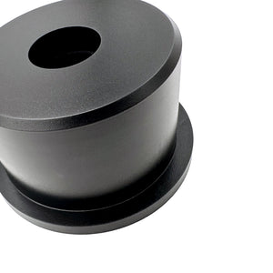 Close up of black polyurethane 95A front control arm bushings (fcab) for BMW E30, E36, Z3. Center style. Made in USA by AKG Motorsport.