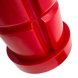 Close up of red polyurethane 75D subframe bushings for BMW E30. Made in USA by AKG Motorsport.