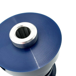 Close up of blue polyurethane 85A subframe bushings for BMW E30. Made in USA by AKG Motorsport.