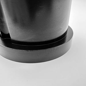 Close up of black polyurethane 95A subframe bushings for BMW E30. Made in USA by AKG Motorsport.