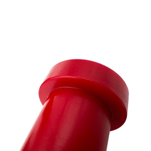 Close up of red polyurethane rear trailing arm bushings (rtab) for BMW E30, Z3, 318ti. Made in USA by AKG Motorsport.