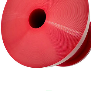 Close up of red polyurethane 75D subframe bushings for BMW E36. Made in USA by AKG Motorsport.