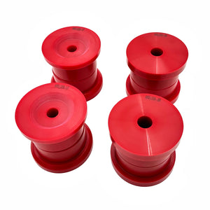 Set of red polyurethane 75D subframe bushings for BMW E36. Made in USA by AKG Motorsport.