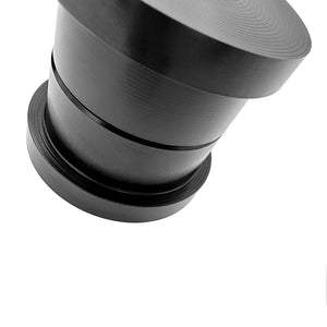 Close up of black polyurethane 95A subframe bushings for BMW E36. Made in USA by AKG Motorsport.