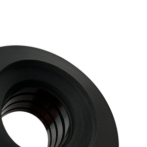 Close up of black polyurethane 95A front control arm bushings (fcab) for BMW E46 M3. Made in USA by AKG Motorsport.  