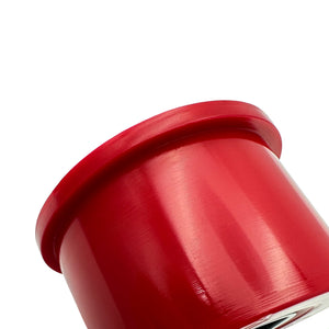 Close up of red polyurethane 75D front control arm bushings (fcab) for BMW E46, Z4 (Non-M). Made in USA by AKG Motorsport.