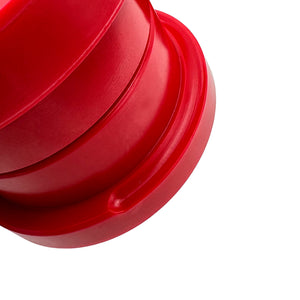 Close up of red polyurethane 75D rear subframe bushings for BMW E46, Z4. Made in USA by AKG Motorsport.