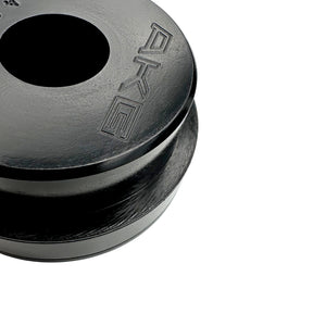 Close up of black polyurethane 95A rear subframe bushings for BMW E46, Z4. Made in USA by AKG Motorsport.