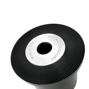 Close up of black polyurethane 95A diff bushings for BMW E90, E92, E82 (Non-M). Made in USA by AKG Motorsport. 