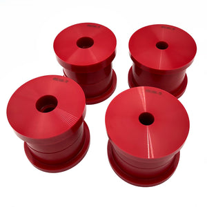 Set of red polyurethane 75D rear subframe bushings for BMW E90, E92, E82. Made in USA by AKG Motorsport.