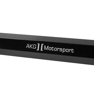 Close up of adjustable aluminum rear toe arms lower for BMW F80 F82 F87. Made in USA by AKG Motorsport. 