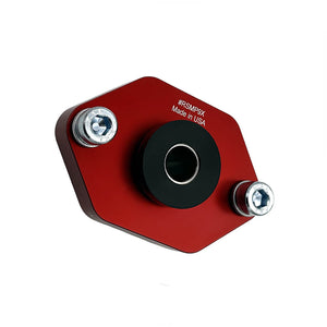 Close up of red BMW E90, E92, E82 lower rear shock mounts with poly bushings (street). Made in USA by AKG Motorsport.