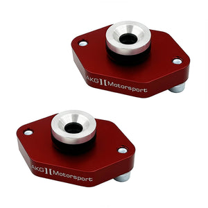 Set of red BMW E90, E92, E82 lower rear shock mounts with poly bushings (street). Made in USA by AKG Motorsport.